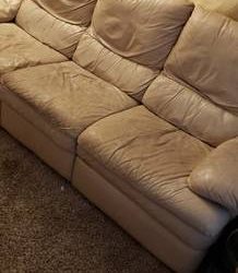 Free cream colored leather couch (Raleigh – ncsu area)