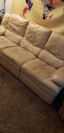 Free cream colored leather couch (Raleigh – ncsu area)