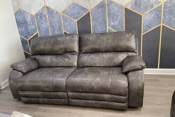 Leather reclining sofa and love seat