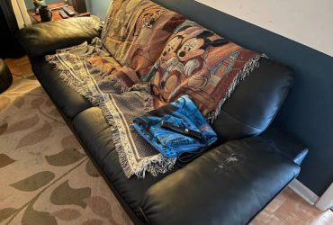 FREE: Black vinyl / fake leather couch (Casselberry)