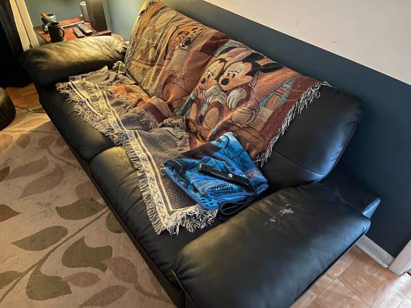 FREE: Black vinyl / fake leather couch (Casselberry)