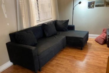 Black Ikea Sofa pulls out into sleeper sofa