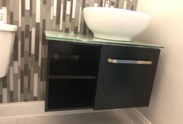 Free floating vanity, sink, faucet and new glass top