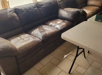 FREE LEATHER CHOCOLATE BROWN COUCH (2840 NE 59TH CT EAST FTL)