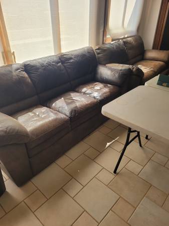 FREE LEATHER CHOCOLATE BROWN COUCH (2840 NE 59TH CT EAST FTL)