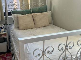 Full-sized bed frame and mattress (New York)