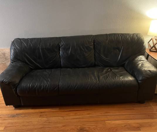 Black “leather” couch (Upper kirby) TX