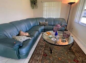Free teal leather couch! (Delray Beach)