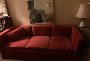 Red corduroy couch and mirror (Weeki Wachee)