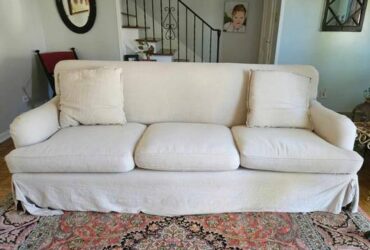 Linen slipcovered sofa