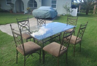 Glass table with 6 chairs (New Port Richey)